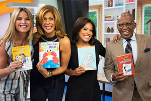 Today show anchors holding up childrens books