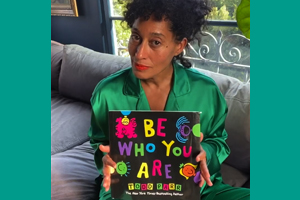 Tracee Ellis Ross holding up Todd Parr's "Be Who You Are" book